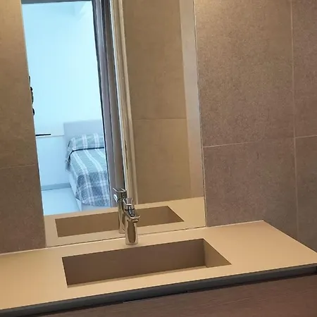 Апартаменти Porto San Vito Градо